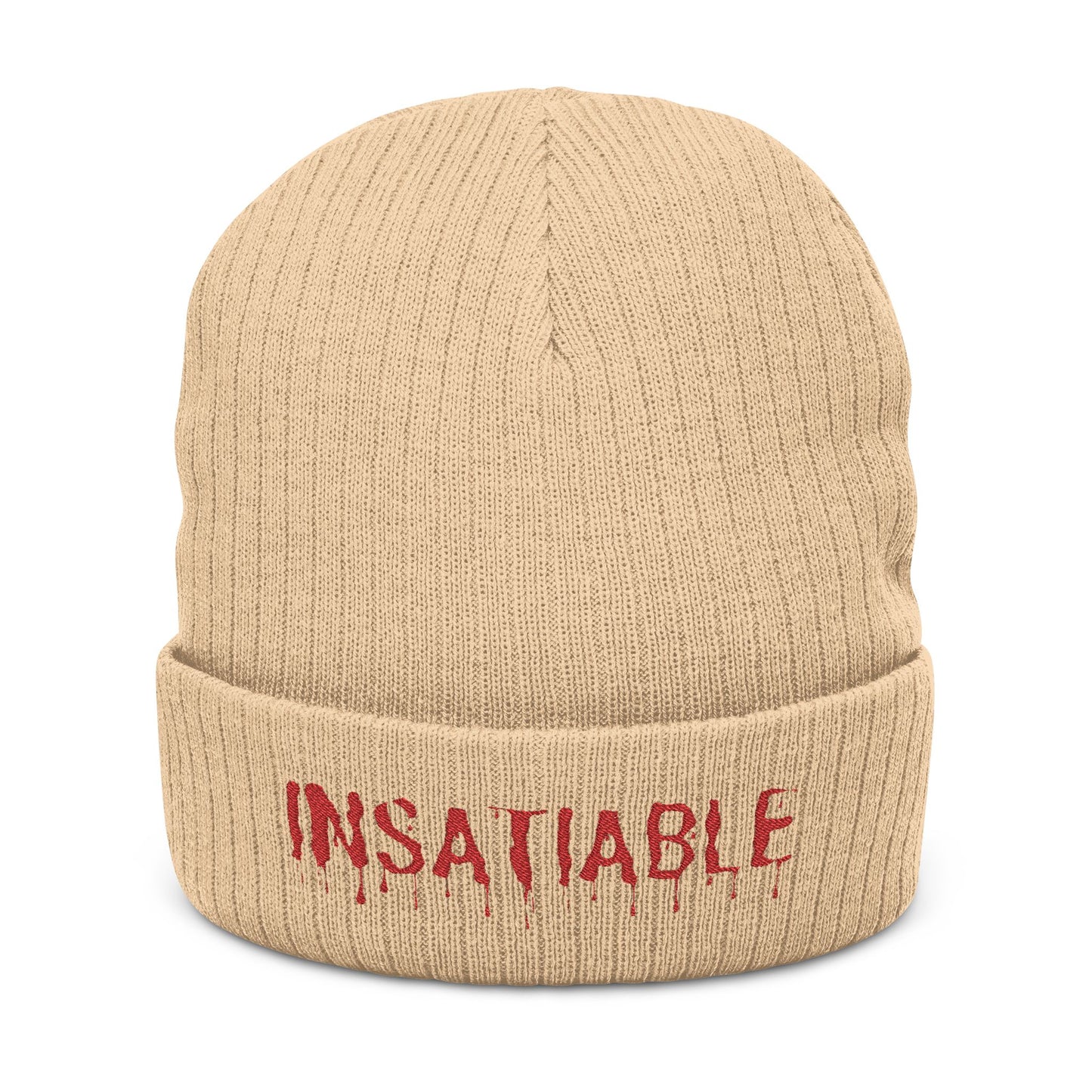 Tan ribbed knit beanie with red embroidered "INSATIABLE" text featuring a dripping design on the cuff.