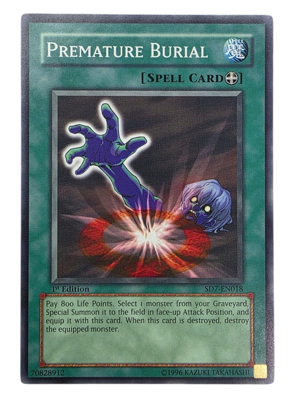 Premature Burial 1st Edition Yu-Gi-Oh! spell card featuring a reaching purple zombie hand.