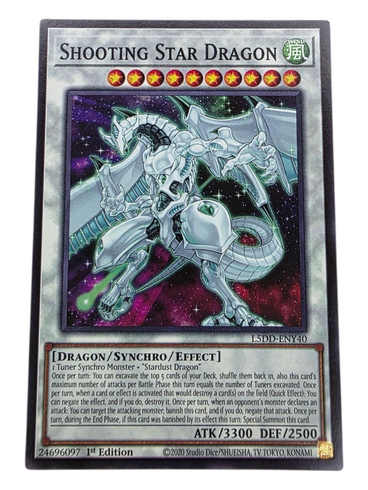 Shooting Star Dragon 1st Edition Yu-Gi-Oh! card with white dragon artwork and space background.