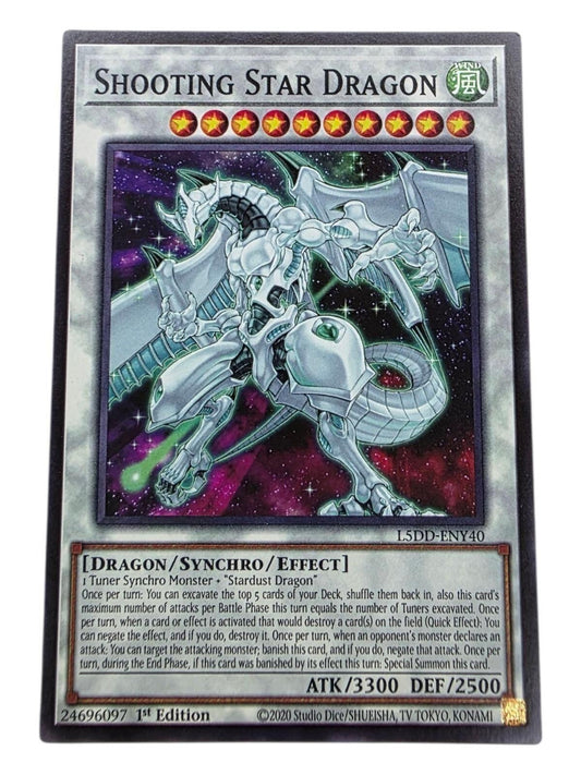 Shooting Star Dragon 1st Edition Yu-Gi-Oh! card with white dragon artwork and space background.