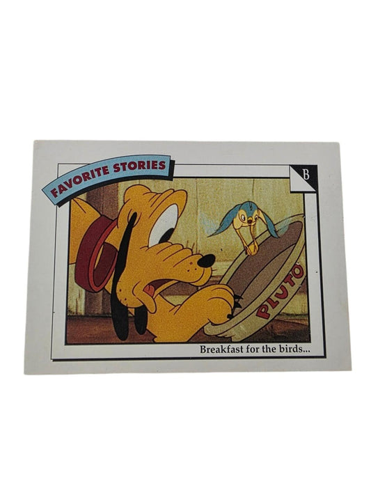 1991 Disney trading card titled "Favorite Stories" featuring Pluto looking at a blue bird in his food bowl.
