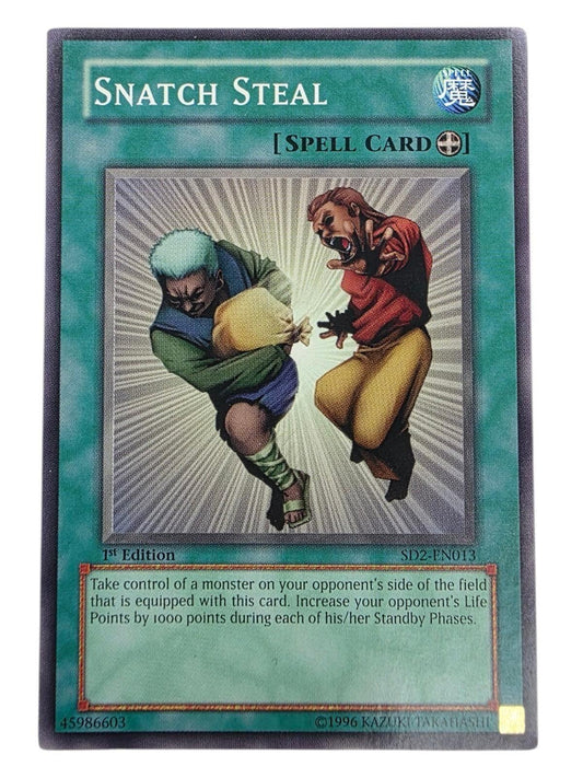 Snatch Steal Yu-Gi-Oh! spell card featuring two figures struggling over a bag in front of radial lines.