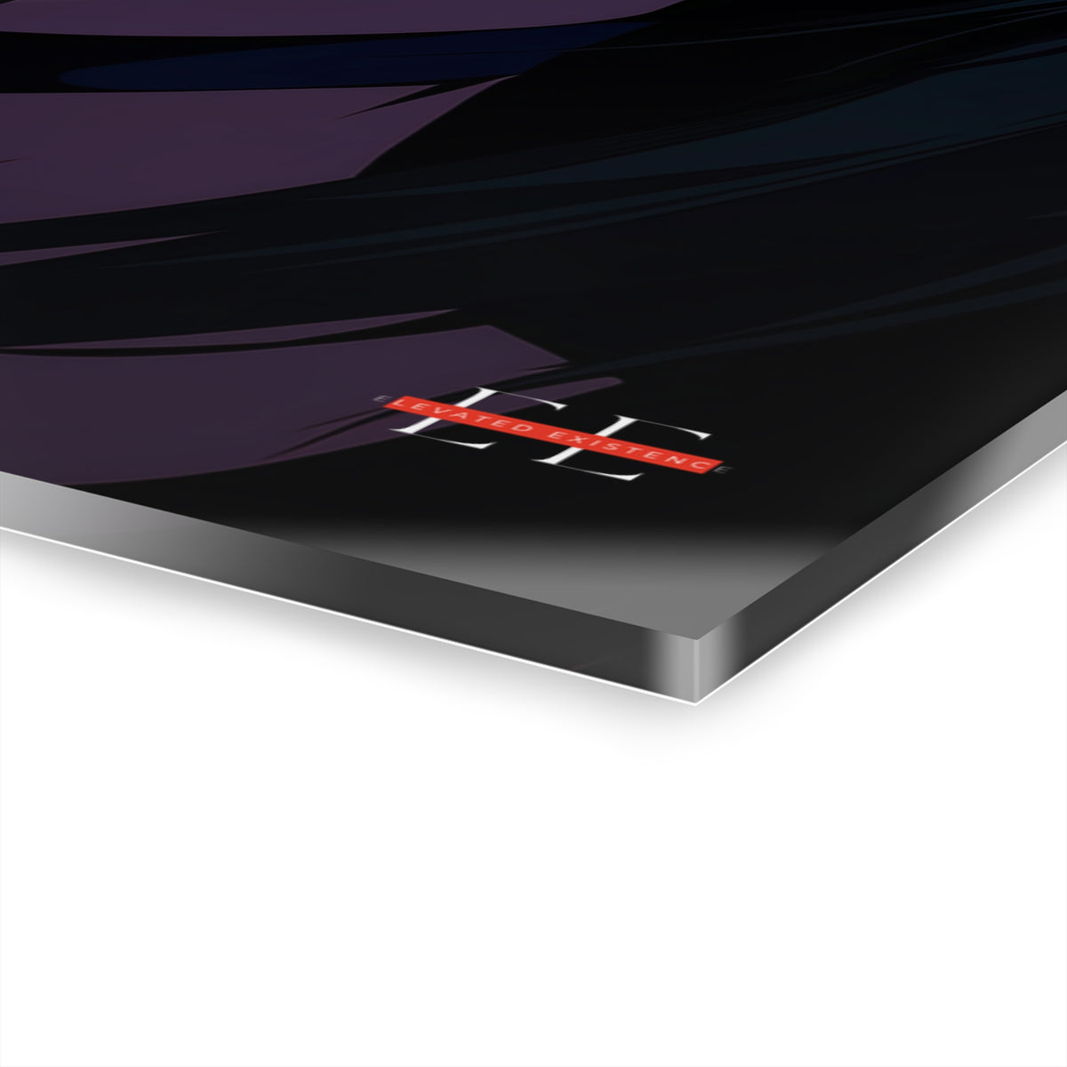 Close-up of the glossy acrylic panel with black, purple, and blue abstract art and an EE logo.