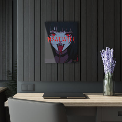Acrylic wall art featuring an anime vampire with red eyes and the word INSATIABLE hanging on a dark wood slat wall.