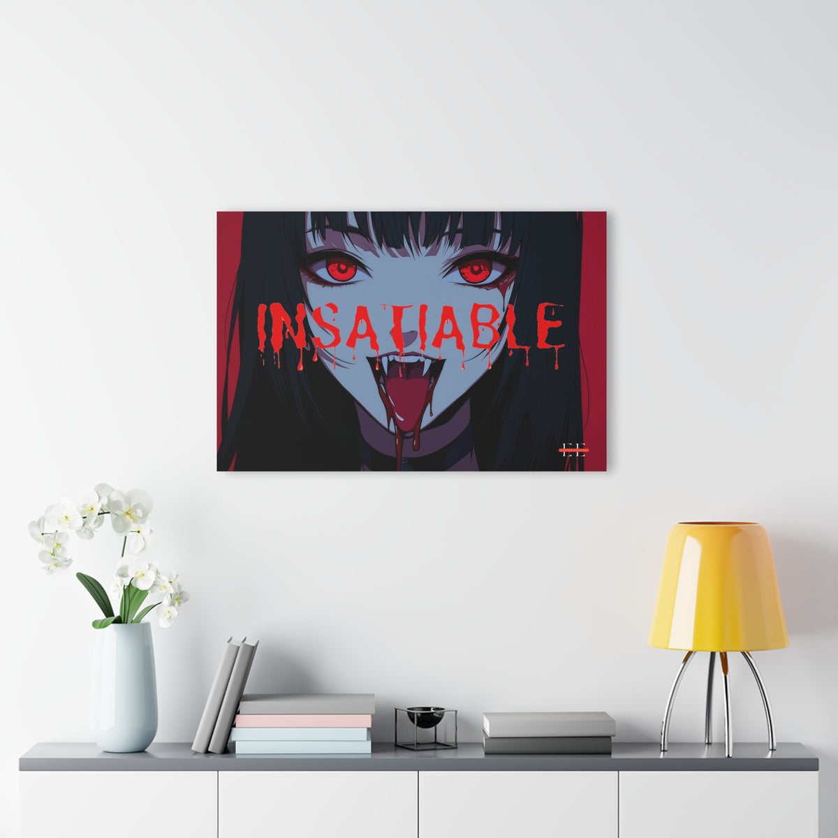 Anime-style acrylic wall art depicting a fanged character and the red text INSATIABLE.