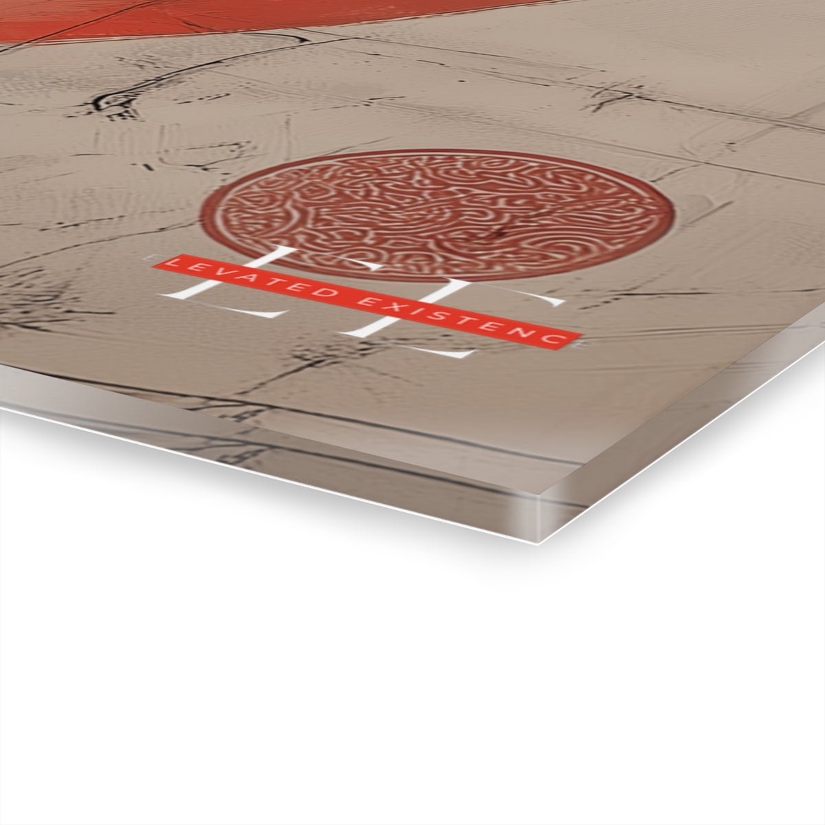 Angled close-up of the glossy acrylic masterpiece showing red and beige artwork with a red circular emblem and text.