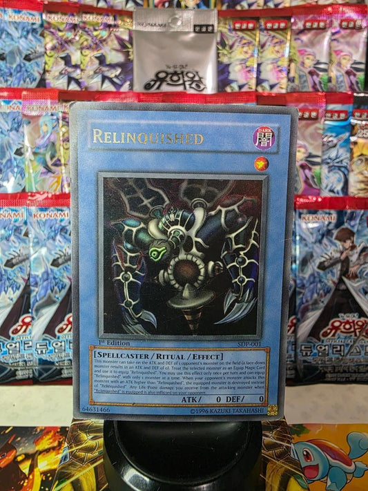 Relinquished Yu-Gi-Oh card in blue frame with foil monster artwork.