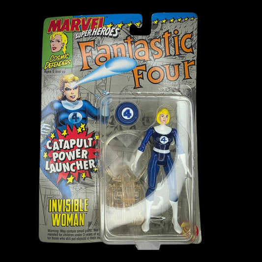 Vintage 1994 Marvel Superheroes Invisible Woman action figure in blue and white suit with launcher on blister card.