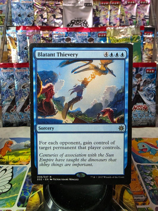 Blatant Thievery Magic card from Explorers of Ixalan, showing artwork of a character leaping toward a flying dinosaur.