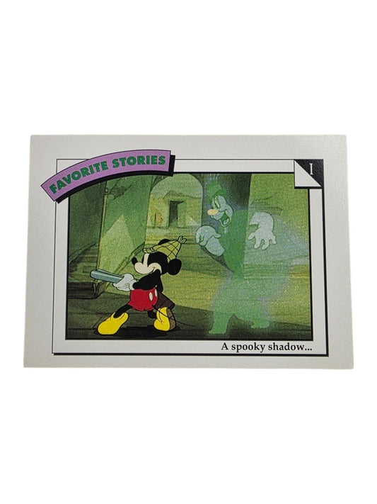 Favorite Stories trading card with Mickey Mouse holding a pipe and looking at a translucent green ghost.