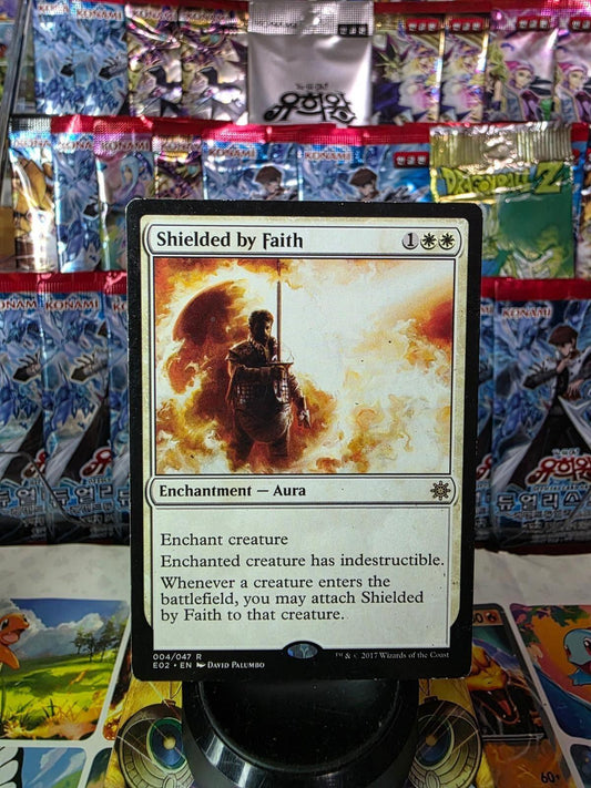 Shielded by Faith Magic card from Explorers of Ixalan in light play condition.