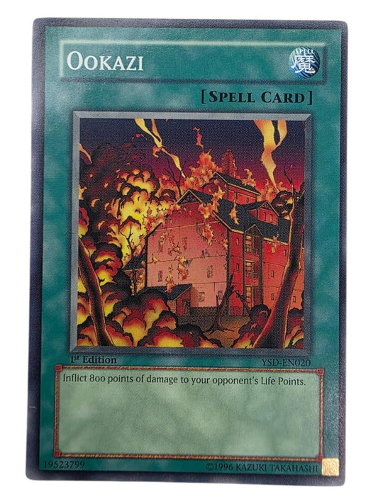 Ookazi 1st Edition Common Spell Card featuring art of a burning building.