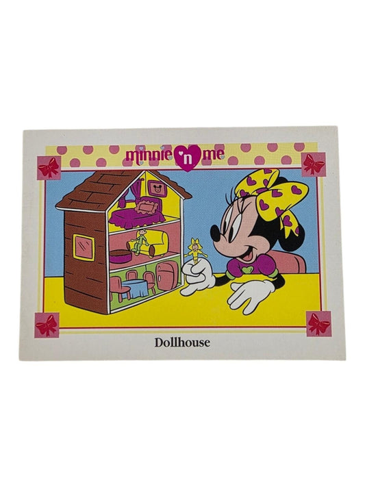 1991 Disney Minnie Mouse trading card featuring Minnie Mouse holding a doll with a dollhouse.
