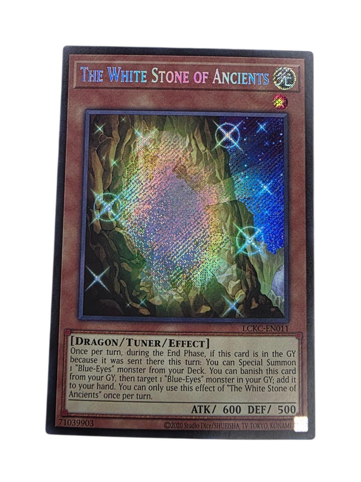 Yu-Gi-Oh! card The White Stone of Ancients Secret Rare with shiny foil artwork.