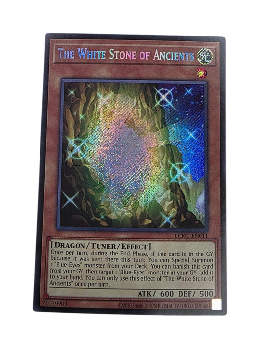 Yu-Gi-Oh! card The White Stone of Ancients Secret Rare with shiny foil artwork.