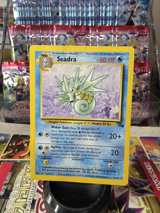 Seadra blue and yellow Pokémon card with 60 HP, Water Gun and Agility attacks.