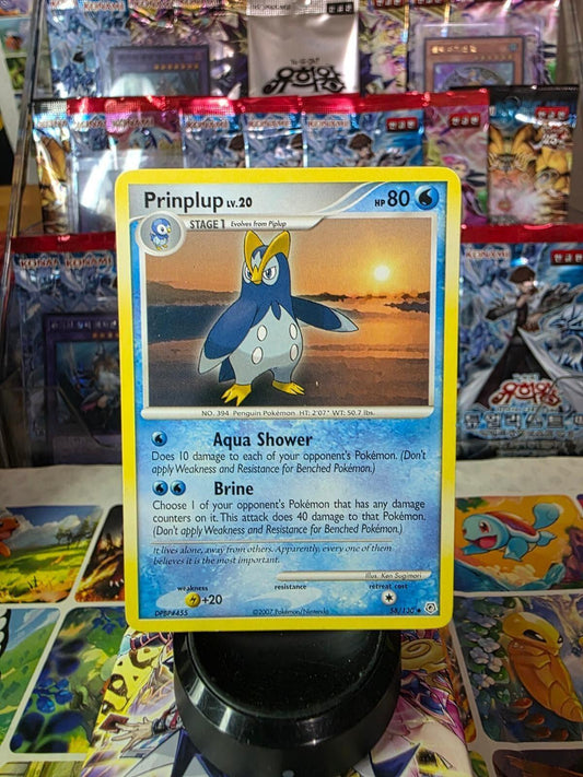 Prinplup Uncommon Diamond and Pearl 58/130 trading card displaying artwork of Prinplup at sunset.
