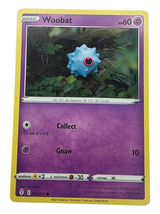 Woobat Common Pokemon card from Evolving Skies showing a blue bat character in foliage.
