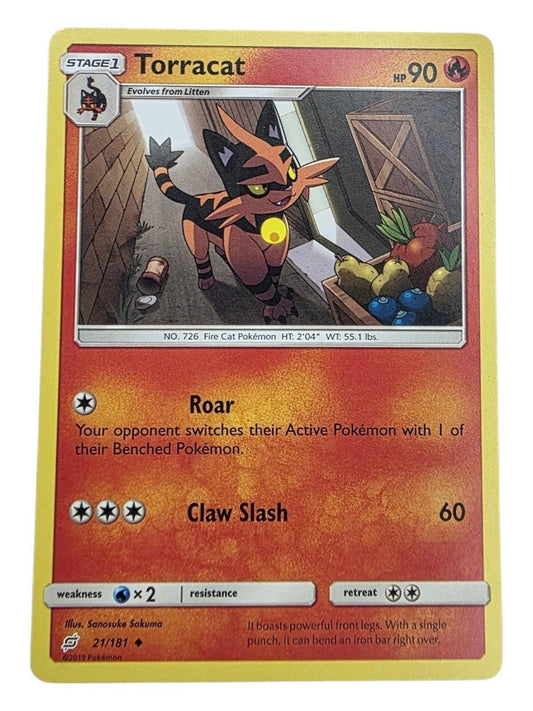 Torracat 21/181 Team Up Pokémon card featuring an illustration of the fire cat character in an alleyway.