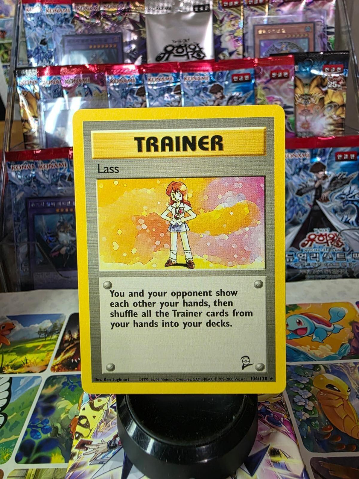 Lass Trainer card from Base Set 2 Pokémon TCG, 104/130, lightly played condition.