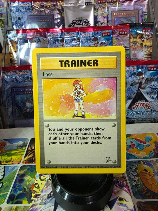 Lass Trainer card from Base Set 2 Pokémon TCG, 104/130, lightly played condition.