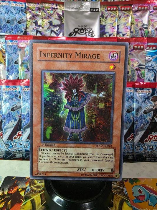 Infernity Mirage 1st Edition Super Rare Yu-Gi-Oh! card against booster packs.