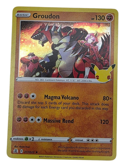 Groudon Holo Rare Celebrations 017/025 Pokémon card showing artwork with Groudon and Magma members.