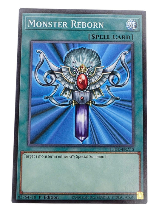 Monster Reborn trading card from Yu-Gi-Oh! featuring the iconic spell card artwork.