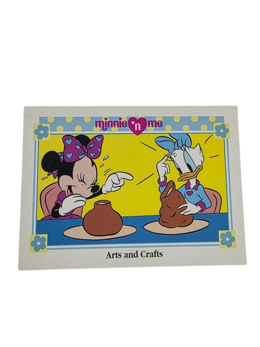 Minnie Mouse and Daisy Duck make pottery on a 1991 Disney Minnie 'n Me trading card labeled "Arts and Crafts."