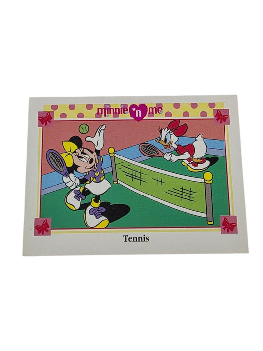 Minnie and Daisy playing tennis on a colorful 1991 trading card with pink, yellow, and green accents.