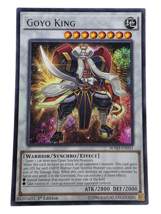 Goyo King 1st Edition Yu-Gi-Oh! card featuring a warrior character holding a sword against a fireworks background.