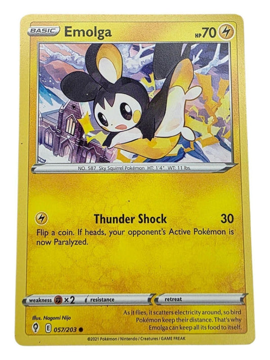 Emolga 057/203 Pokémon card from Evolving Skies showing an illustrated Emolga flying over a building.