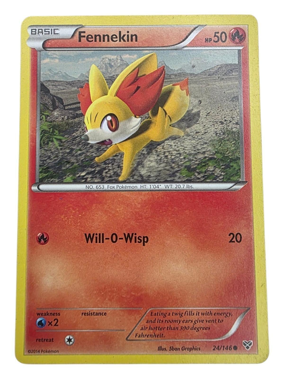 Fennekin 24/146 XY Base Set Pokemon card showing the fox character running.