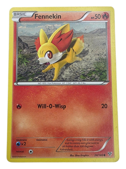 Fennekin 24/146 XY Base Set Pokemon card showing the fox character running.
