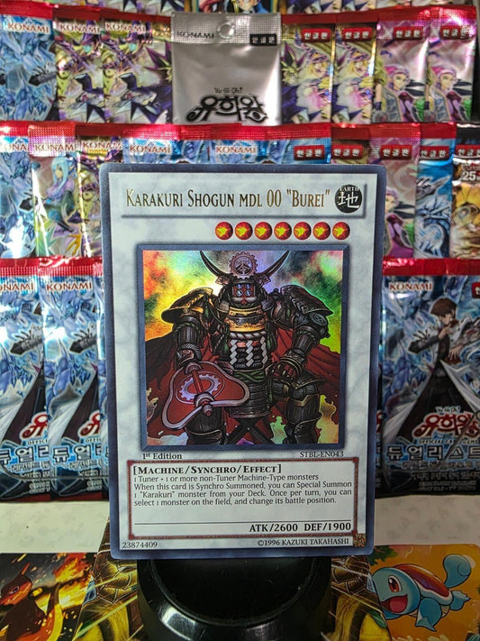Ultimate Rare Karakuri Shogun mdl 00 Burei trading card from Starstrike Blast.