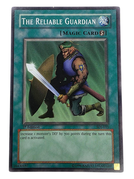 The Reliable Guardian Yu-Gi-Oh! Magic Card featuring a warrior with a sword and shield.