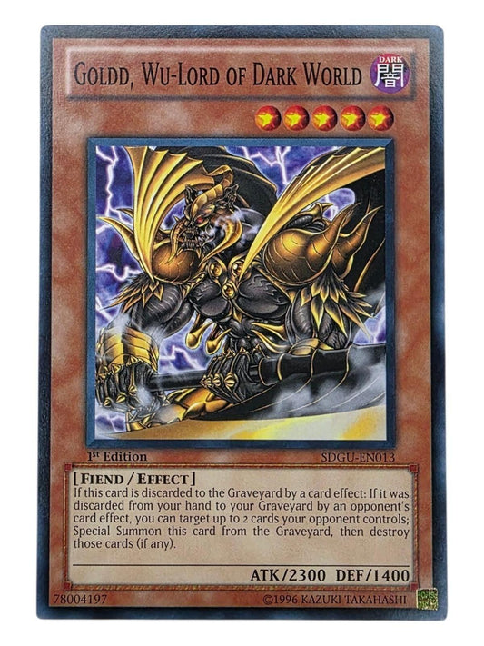 Goldd, Wu-Lord of Dark World Yu-Gi-Oh! card showing a horned fiend in gold and black armor.