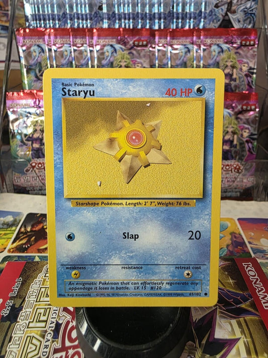 Vintage Staryu Pokémon card featuring a 3D-style star character on a sandy background, with a blue and yellow border.