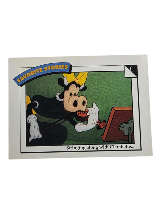 Clarabelle Cow plays a violin on a white-bordered "FAVORITE STORIES" card with "Stringing along with Clarabelle..." below.