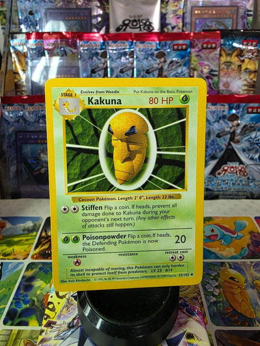 Kakuna uncommon Base Set 2 Pokémon card with 80 HP, standing on a black stand.