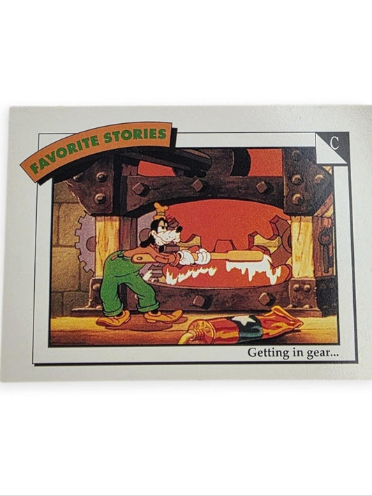 1991 Disney trading card featuring Goofy in green pants inside a machinery setting.