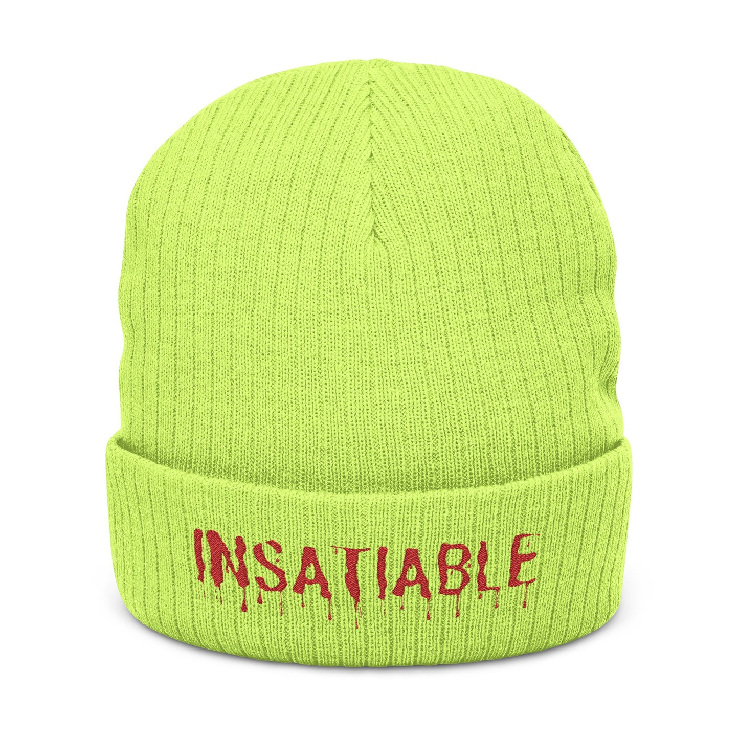 Bright neon yellow ribbed knit beanie with the word "INSATIABLE" embroidered in red dripping font on the cuff.