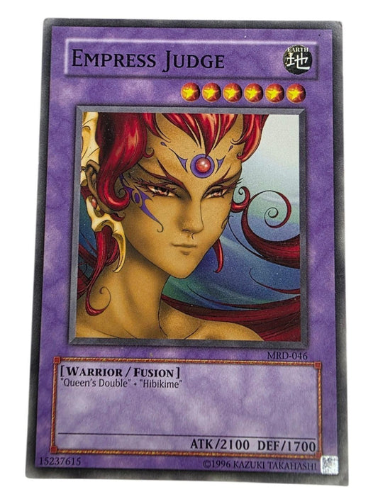 Empress Judge Yu-Gi-Oh! trading card featuring artwork of a warrior with red hair and gold skin.