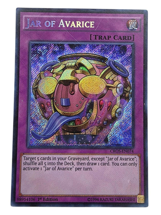 Jar of Avarice Secret Rare Yu-Gi-Oh! trap card with holographic foil finish.
