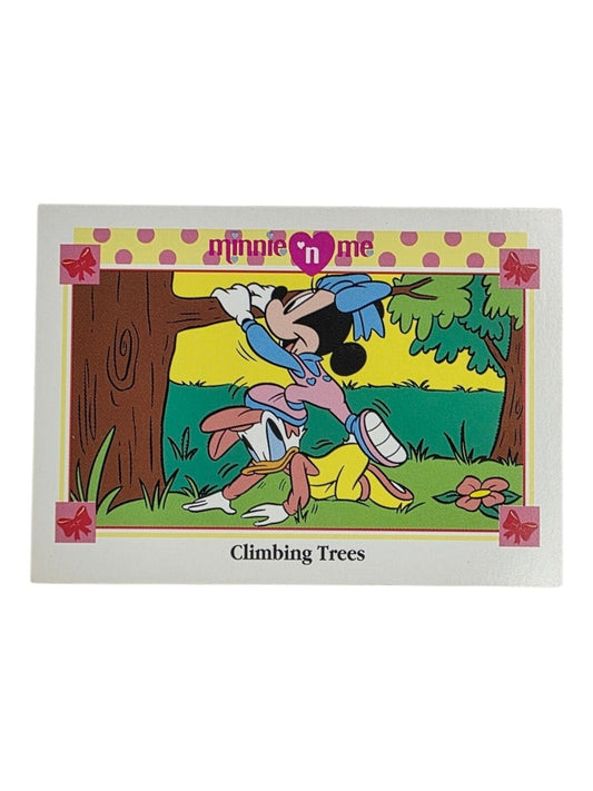 1991 Minnie 'n Me trading card titled "Climbing Trees," featuring Minnie Mouse and Daisy Duck.
