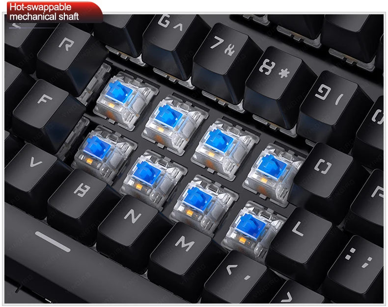 Close-up of a black mechanical keyboard with blue hot-swappable switches exposed amidst removed keycaps.
