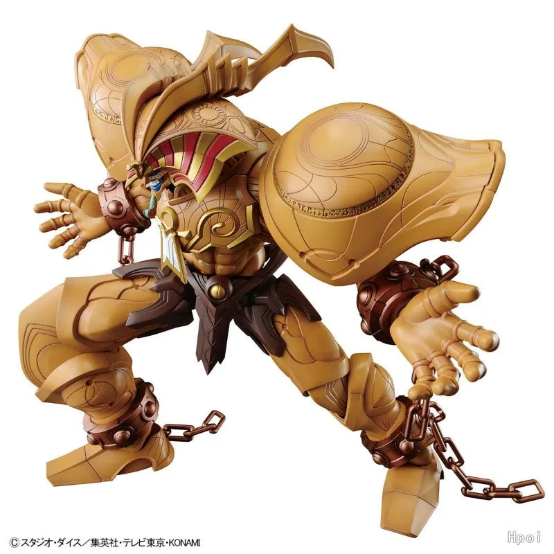 Tan and brown muscular action figure wearing Egyptian-style headdress, shoulder guards, and broken chains.
