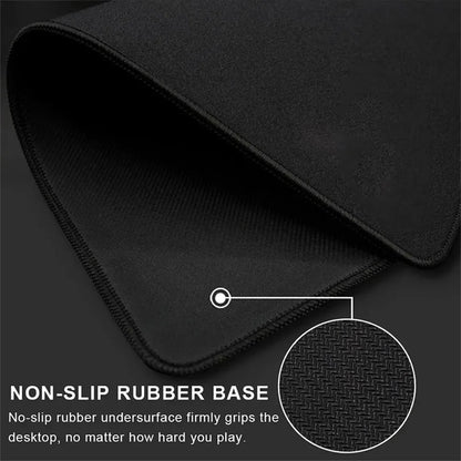 Black gaming mouse pad with stitched edges and a textured non-slip rubber base.