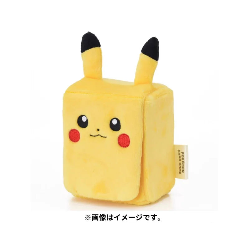 Yellow, cube-shaped Pikachu plush card storage box with black-tipped ears, red cheeks, and a small Pokémon Card Game tag.