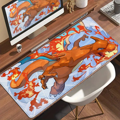Large anime Charizard desk mat featuring the orange dragon breathing fire against a light blue background.
